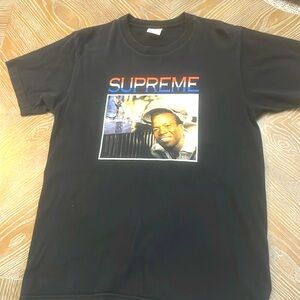 Men’s Supreme shirt size men’s medium.